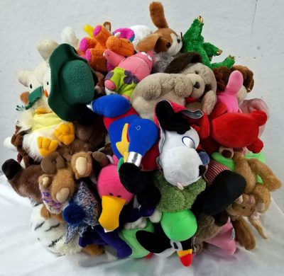 Large ball made up of various stuffed animals