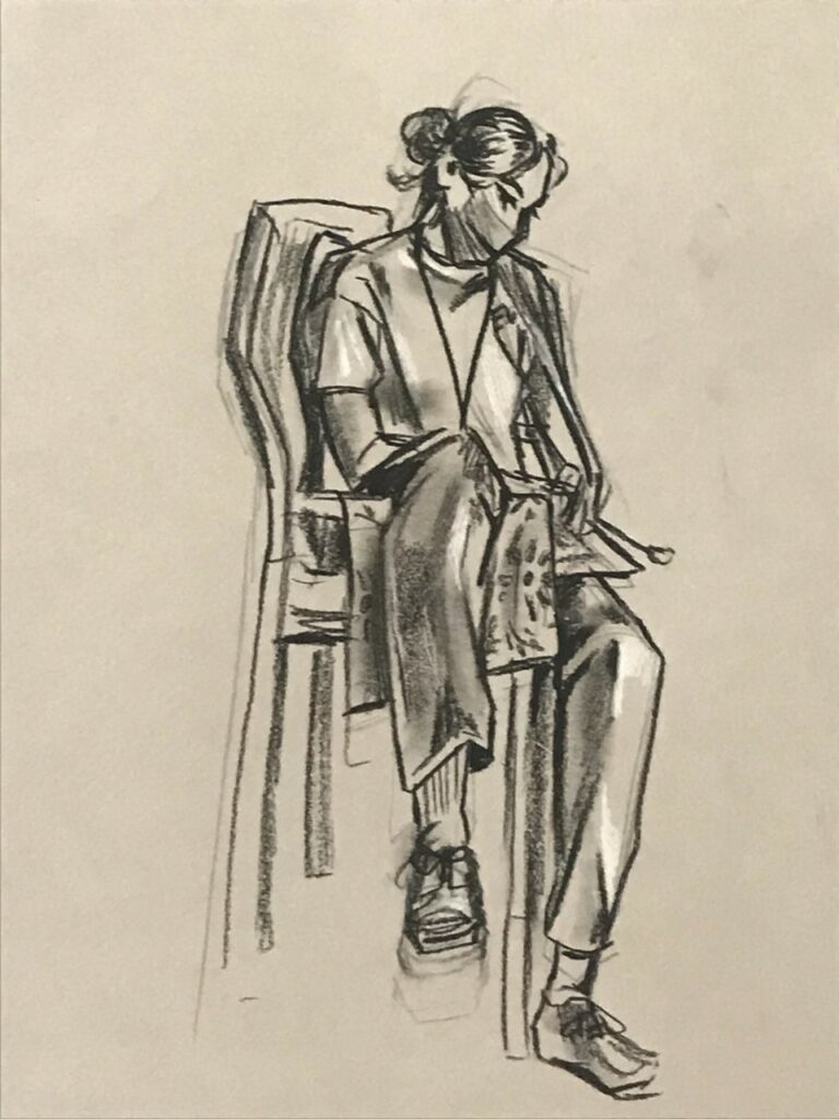 Charcoal drawing of a woman seated in a tall chair with a leg draped over one of the arms. She is looking down at the floor and has her hair up in a bun.