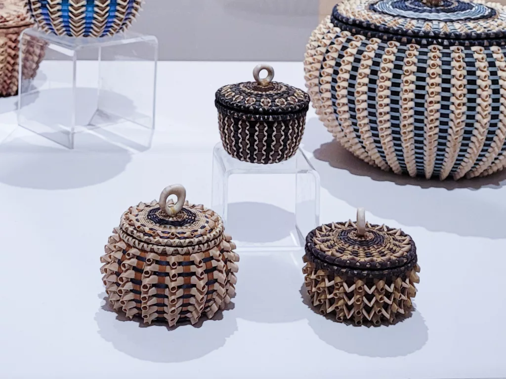 Photograph of a grouping of tiny baskets.